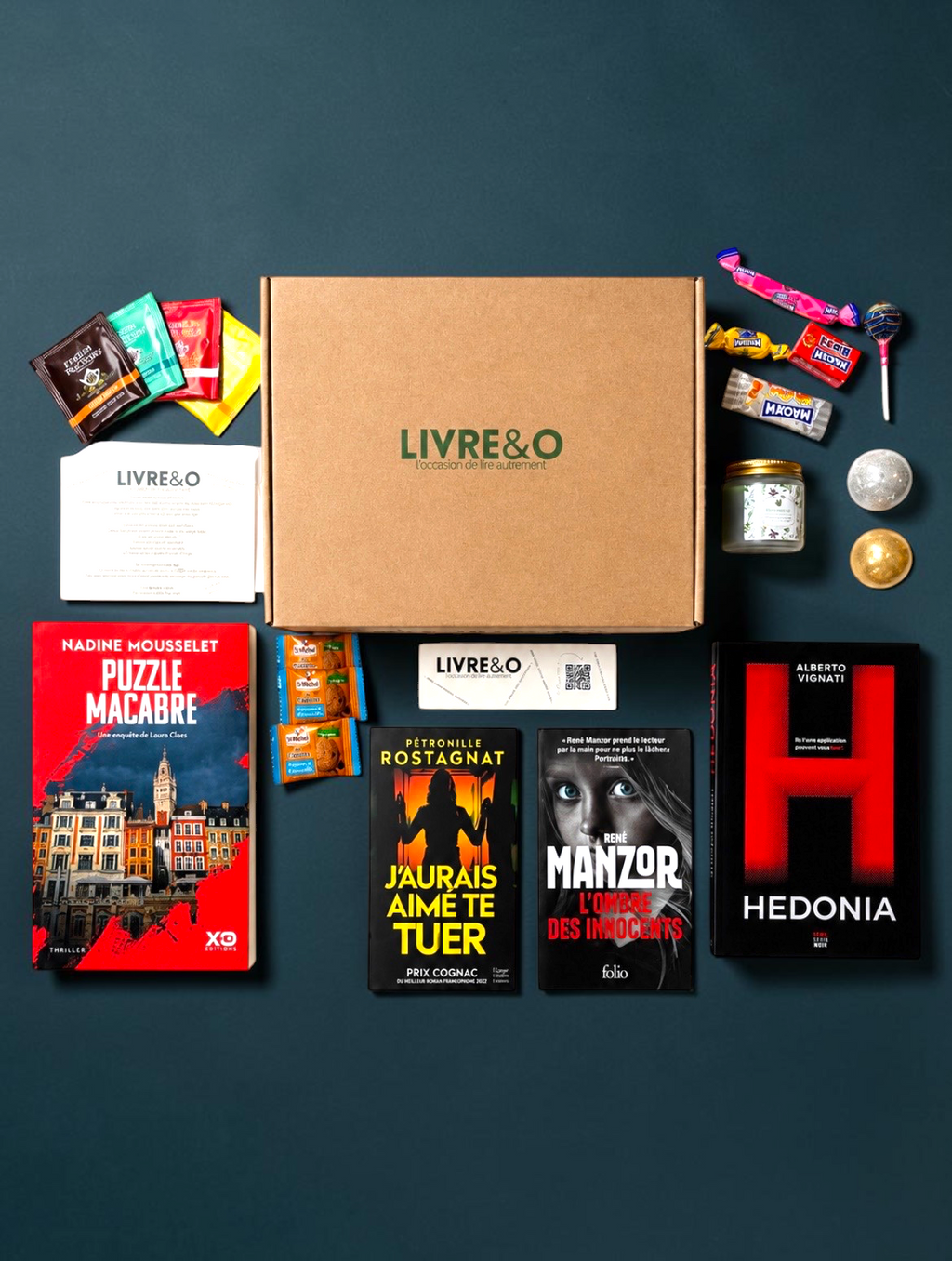 Box Signature LIVRE&O contenant quatre romans thriller et polar d'occasion, accompagnés de gourmandises et surprises.